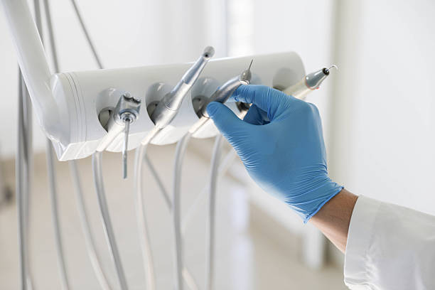 Professional Tooth Extraction technician working in Lake Charles, LA